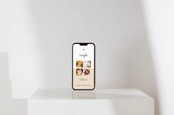 Free iPhone on white background mockup - Mockups Design