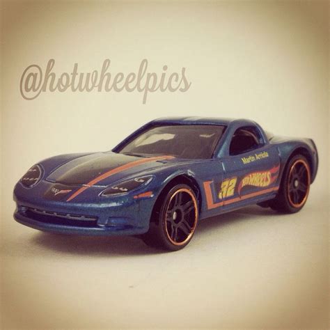 a blue toy car with orange stripes on it