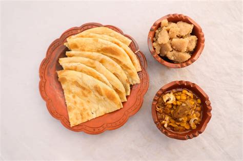 Desi Nashta Dal Chicken, Halwa and Paratha Served in Dish Isolated on Background Top View of ...