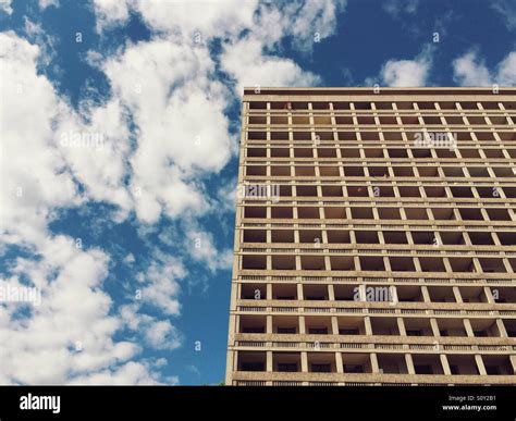 Residential building and cloudy sky Stock Photo - Alamy