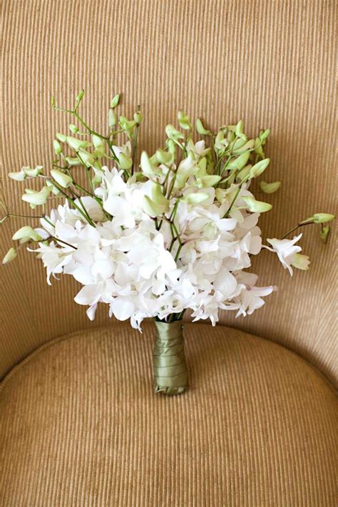 Bouquets Photos - White Dendrobium Orchid Bouquet - Inside Weddings