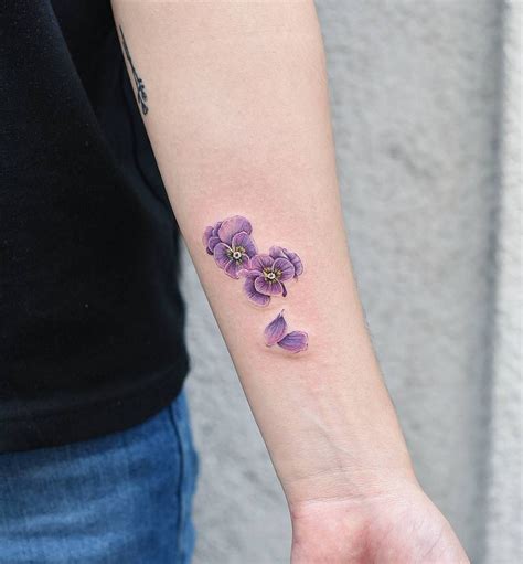 Purple flowers tattoo on the left inner forearm | Tatouage, Tatouage violet, Tatouage cool