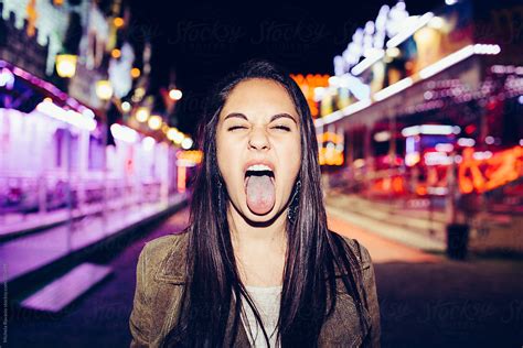 "Girl Sticking Tongue Out" by Stocksy Contributor "Michela Ravasio ...