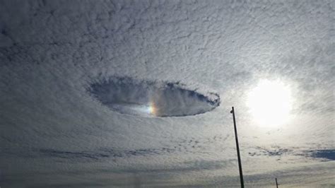 Santa magic rainbow hole punch cloud over Iowa on Christmas Day 2014 ...