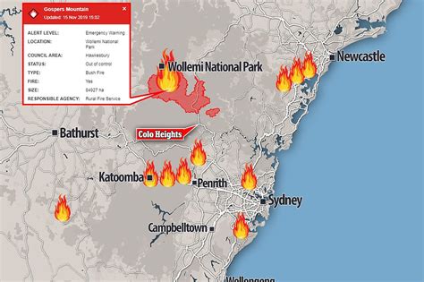 Spectacular pictures show massive fire destroy bushland as another hits the outskirts of Sydney ...