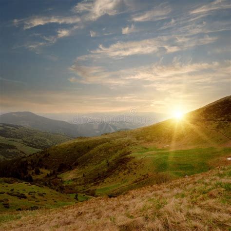 Mountain valley and sunset stock image. Image of scene - 14476789