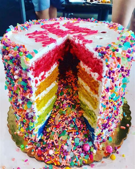 Ashley S on Instagram: “Rainbow explosion cake 💥 🌈 @bakechicago # ...