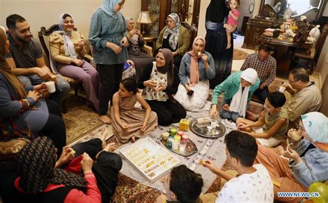 Members of Egyptian family celebrate Eid al-Fitr at home amid COVID-19 ...