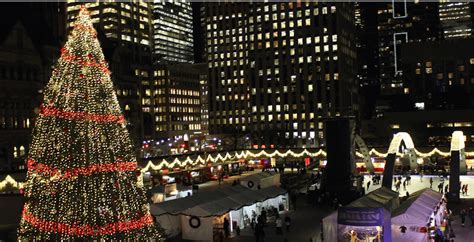 Toronto's official Christmas tree gets lit at Nathan Phillips Square ...