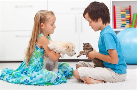 Kids with their pets - dog and cat - Montessori Academy of Cincinnati