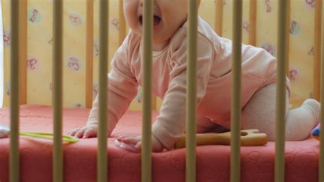 Crying Baby In Crib At Home Close Up Stock Footage SBV-332074236 - Storyblocks