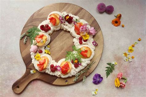 Simple meringue wreath with lemon curd and edible flowers | Amy Treasure