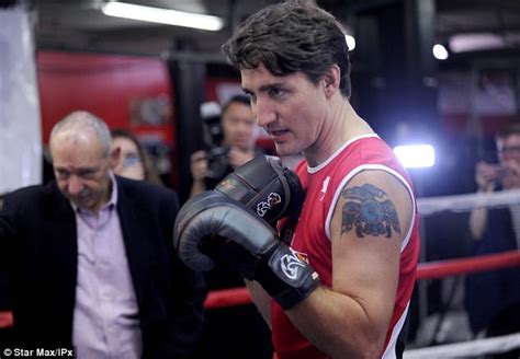 Prime Minister Justin Trudeau flashes his raven tattoo | Daily Mail Online