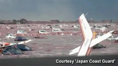 Raw Footage of Planes Swept Away by Japan Tsunami