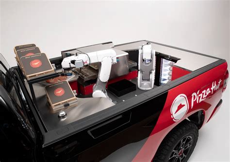 Pizza Hut reveals a concept delivery truck with a built-in robotic ...