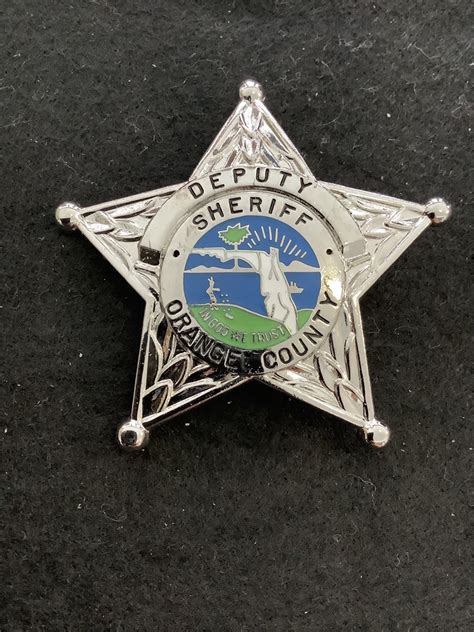 Collectors-Badges Auctions - Orange County, Florida deputy sheriff badge