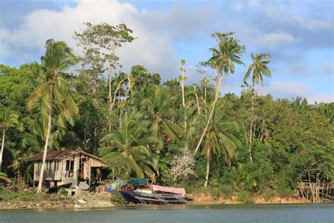 Boat and House on Riverbank Stock Photo - Image of scene, philippine: 108725720