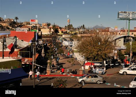 Shoppers in Nogales, Sonora, Mexico, patronize businesses near the ...