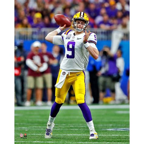 Joe Burrow LSU Tigers Unsigned White Jersey Throwing Photograph