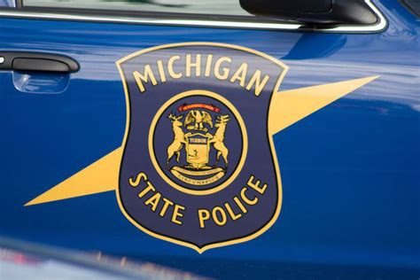 Michigan State Police cars set on fire, shot at by suspect who is still ...