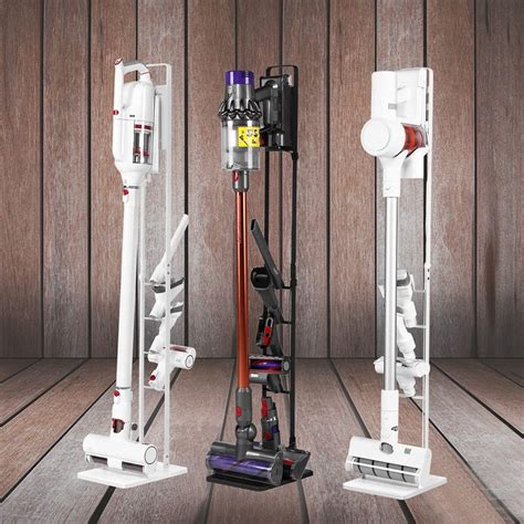 three different types of vacuum cleaners on a wooden floor