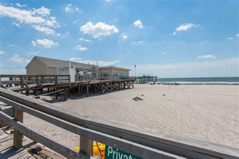 dock leading to beach margate city nj