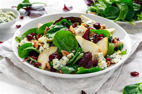 Fresh Pears, Blue Cheese Salad with Vegetable Green Mix, Walnuts, Cranberry. Healthy Food Stock ...