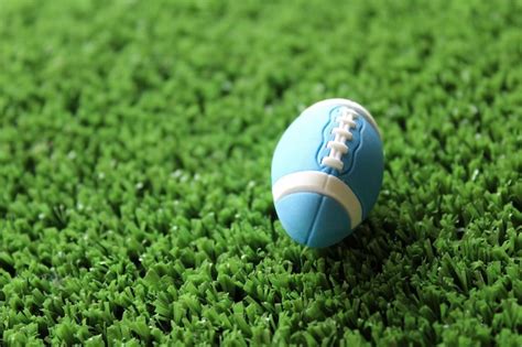 Premium Photo | Selective focus image of rugby ball on rugby pitch grass with copy space sport ...