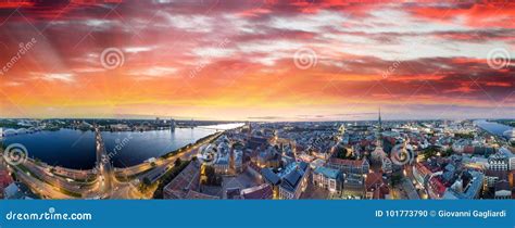 Riga, Latvia. City Skyline and River at Night - Aerial View Stock Photo ...