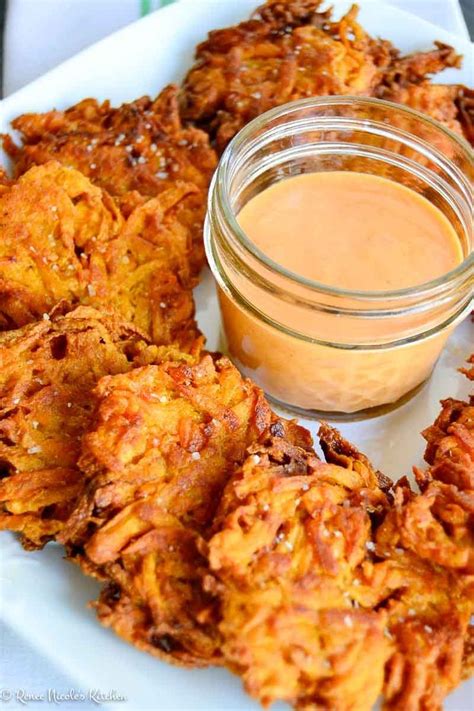 Lightly seasoned and pan fried these sweet potato fritters are served ...