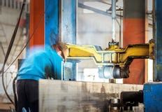 Steel-workers And Machinery Royalty Free Stock Photography - Image: 27894317