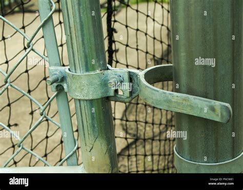 chain link fence hardware Stock Photo - Alamy