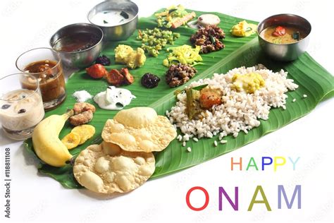 Onam feast on banana leaf isolated on white Stock Photo | Adobe Stock