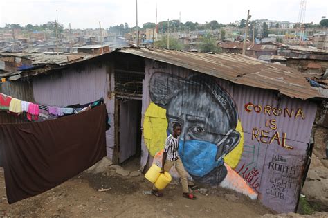 Youth in Nairobi slum use murals to educate the community about COVID ...