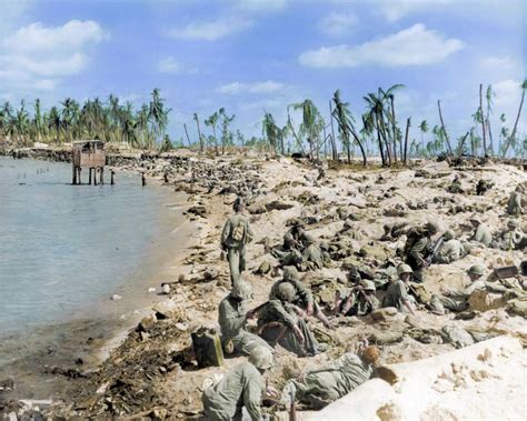 US marines huddled on the beaches during the Battle of Tarawa in World War Two, Kiribati, 1943 ...