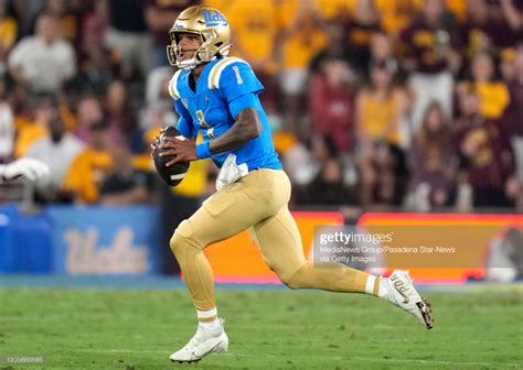 Quarterback Dorian Thompson-Robinson of the UCLA Bruins scrambles... | Ucla, Ucla bruins, Ucla ...