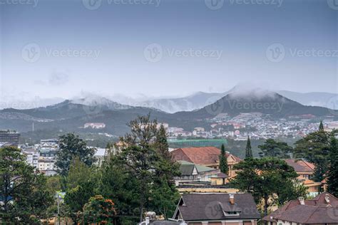 View on roofs in the city of Dalat. Da Lat and the surrounding area is ...