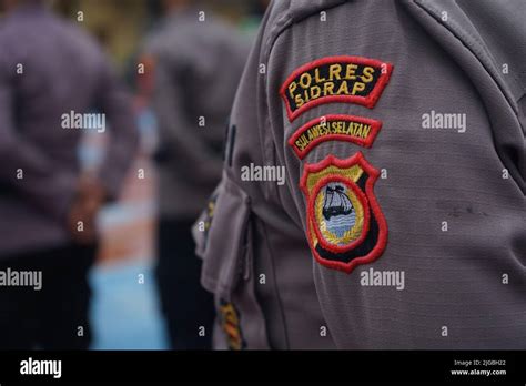 Indonesian police wear full uniform Stock Photo - Alamy