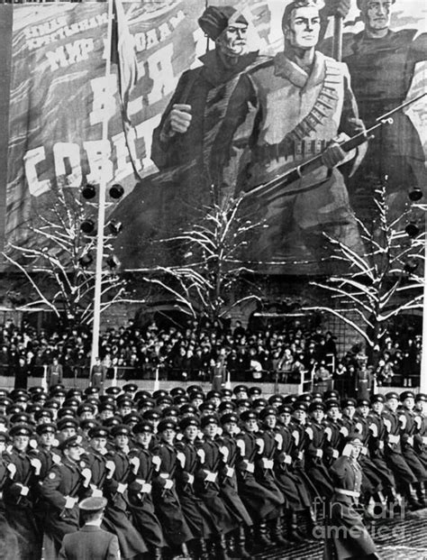 Enlisted servicemen of the Soviet Army march through Red Square in the 50th Anniversary Parade ...