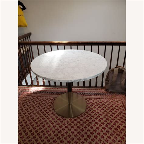 West Elm Round Marble Restaurant Table - AptDeco