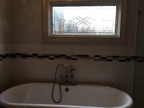 Stained & Beveled Glass Insulated Window Above A Bathtub