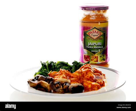 Chicken curry spinach mushrooms meal hi-res stock photography and ...