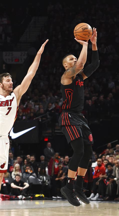 Lillard, Blazers extinguish Heat for 10th straight victory | Inquirer ...