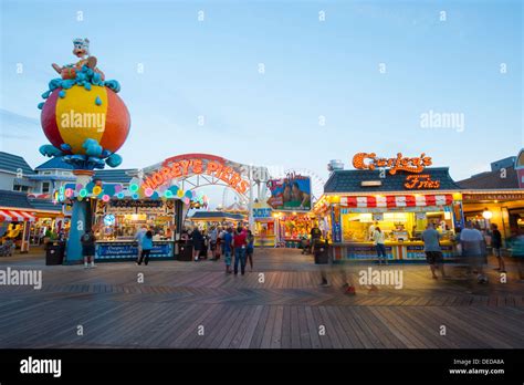 USA New Jersey NJ Shore Wildwood boardwalk at night food games rides Stock Photo: 60529738 - Alamy