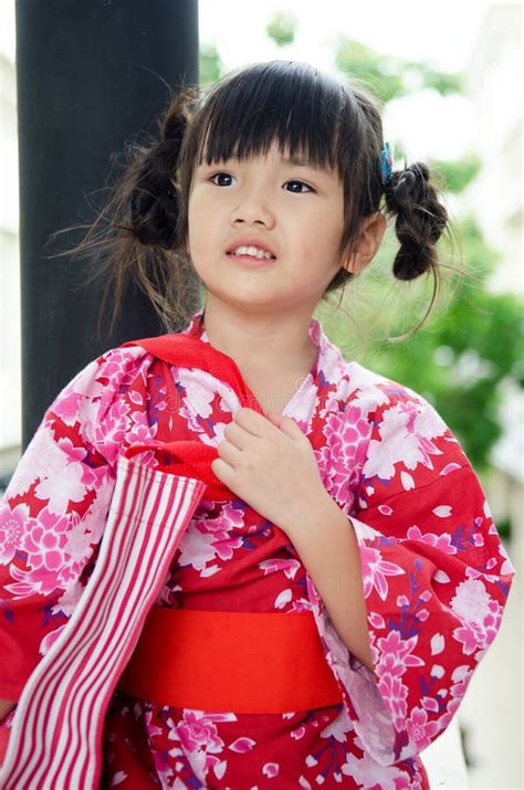 Little Asian Child In Japanese Traditional Costume Stock Photo - Image: 43291862