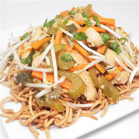 "Pan-fried chow mein noodles are tossed in a light Asian sauce and topped with tender slices of ...