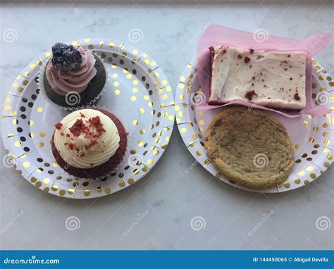 Goodies and good times stock image. Image of good, cupcakes - 144450065