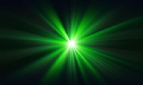 Premium Photo | Green laser beam on a dark background