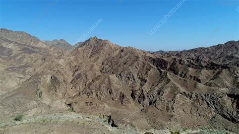 Aerial view of rocky mountains - Stock Video Clip - K012/4116 - Science Photo Library