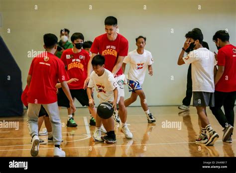 Taguig City, Philippines. 8th Feb, 2023. Zhu Songwei (C) of the Bay Area Dragons participates in ...